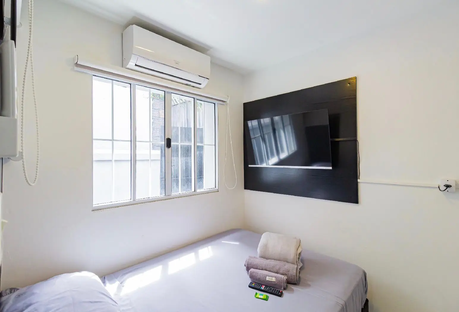 Quarto com ar-condicionado